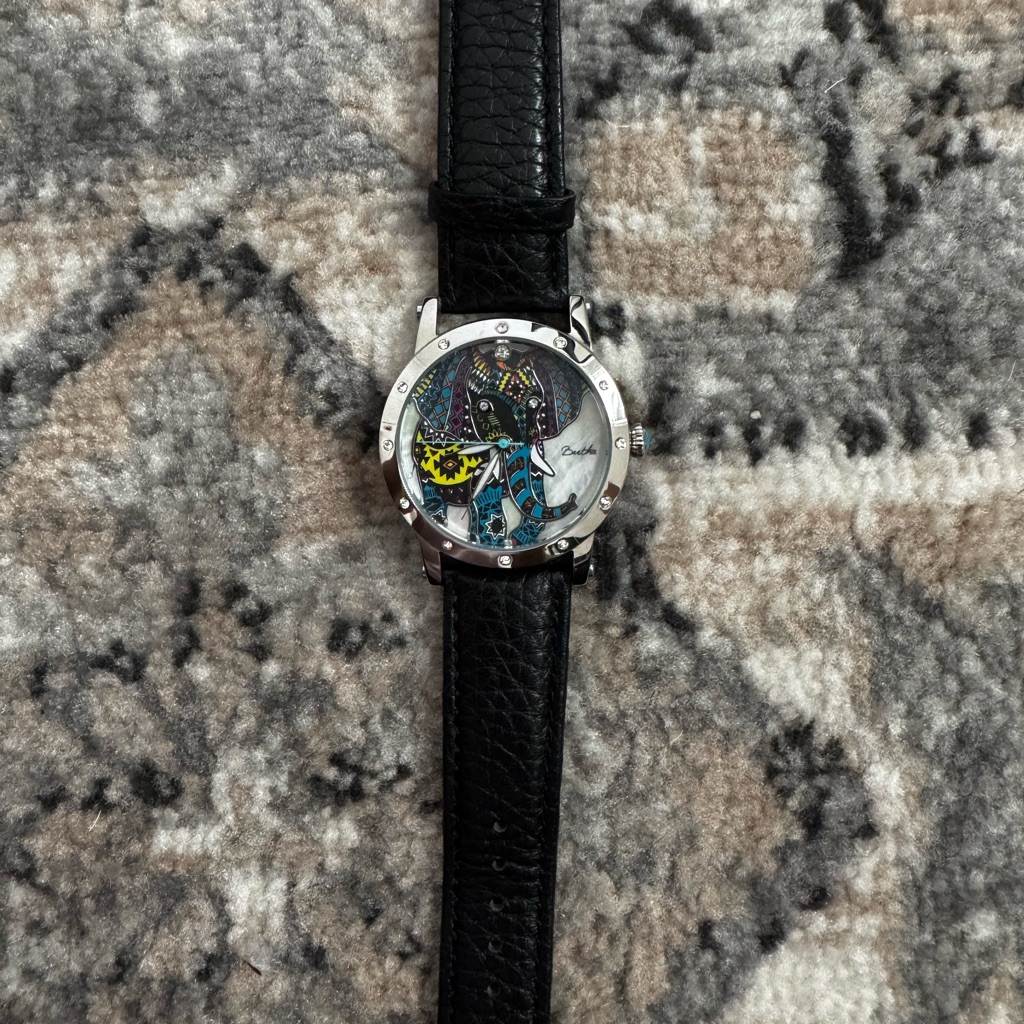 Black Leather Strap Watch With Silver Accents